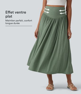 Falda midi de punto acanalado, cintura alta con efecto moldeador en el abdomen, fluida y casual, en mezcla de lino.