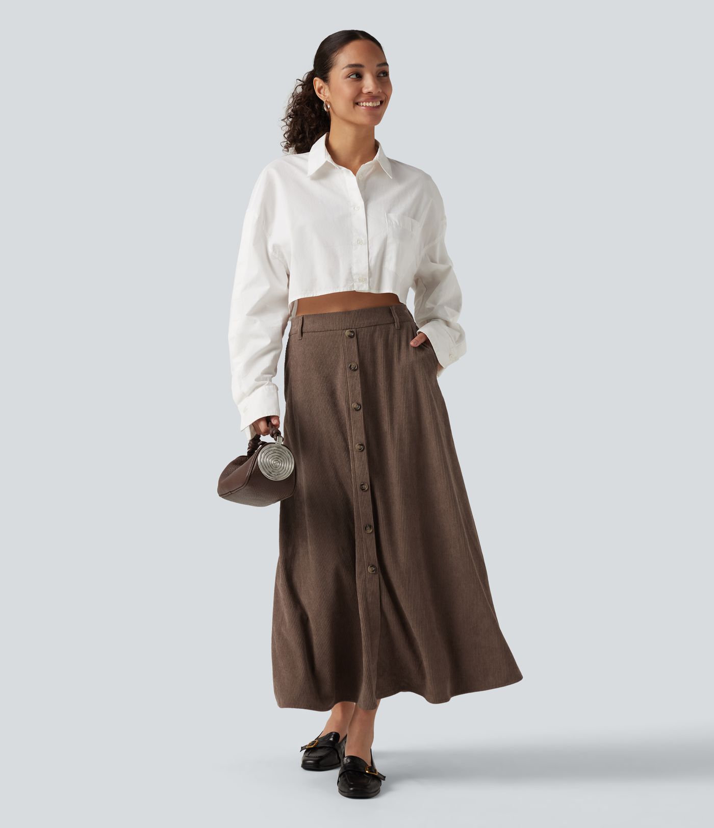 Jupe midi en velours côtelé taille haute coupe trapèze avec poches Jupe midi en velours côtelé taille haute coupe trapèze avec poches