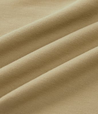 Schmal zulaufende Bürohose aus Baumwolle mit hohem Bund, Seitentaschen und gerolltem Saum