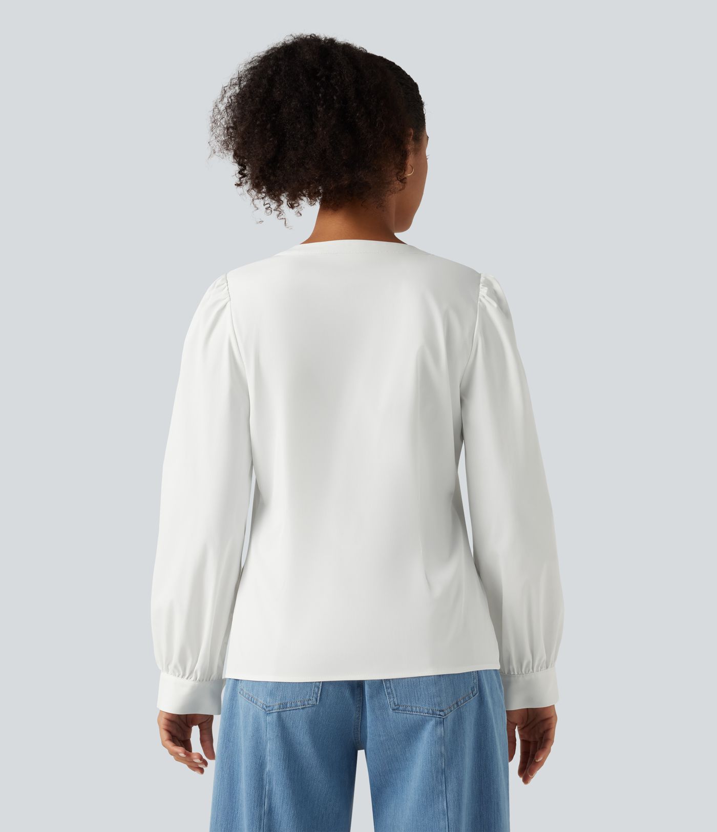 Lässige Bluse mit Henley-Ausschnitt und langen Puffärmeln