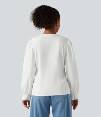 Lässige Bluse mit Henley-Ausschnitt und langen Puffärmeln