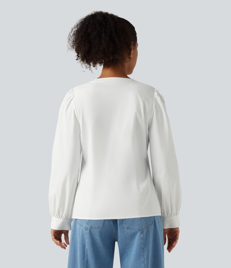 Lässige Bluse mit Henley-Ausschnitt und langen Puffärmeln