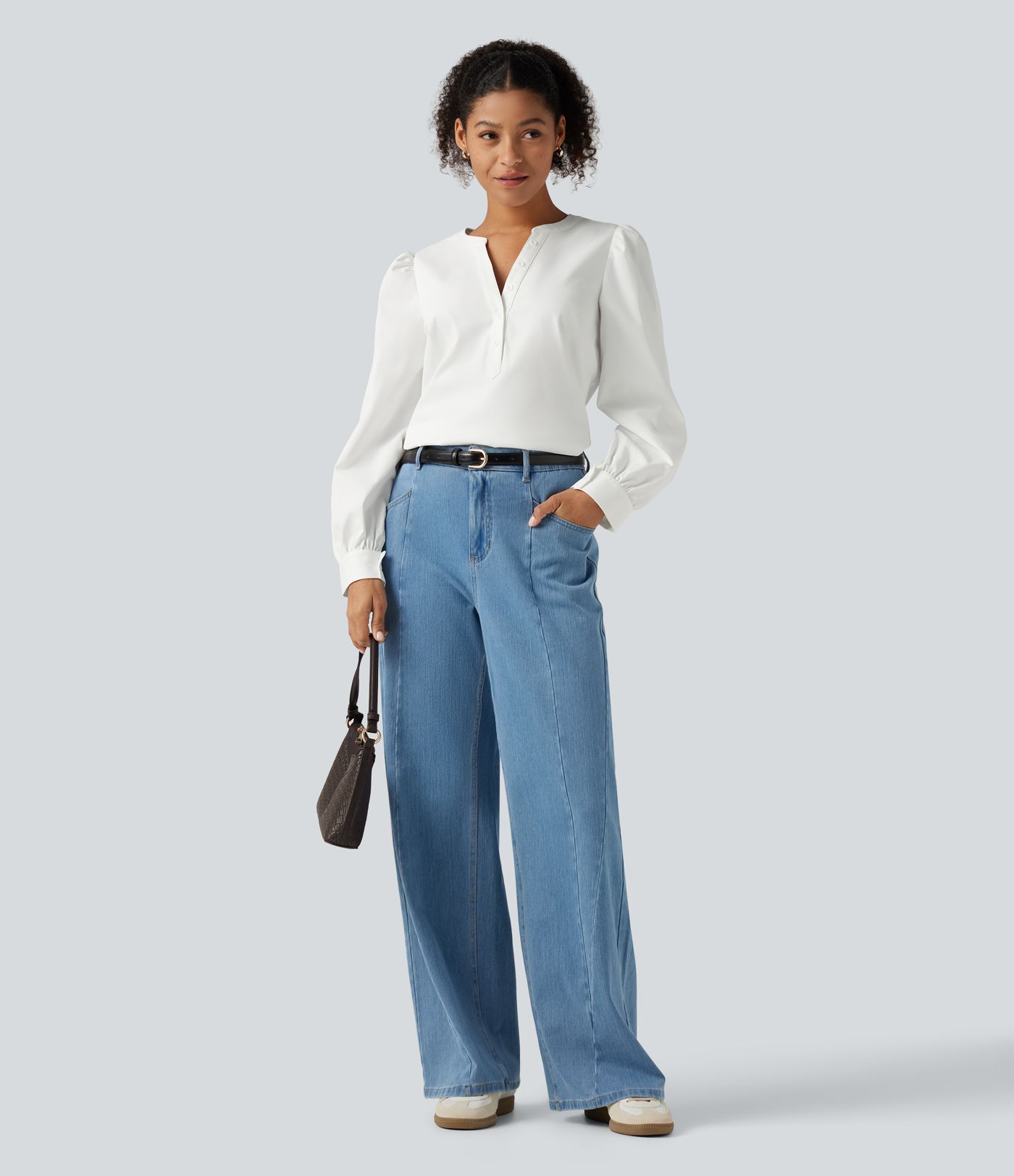 Lässige Bluse mit Henley-Ausschnitt und langen Puffärmeln