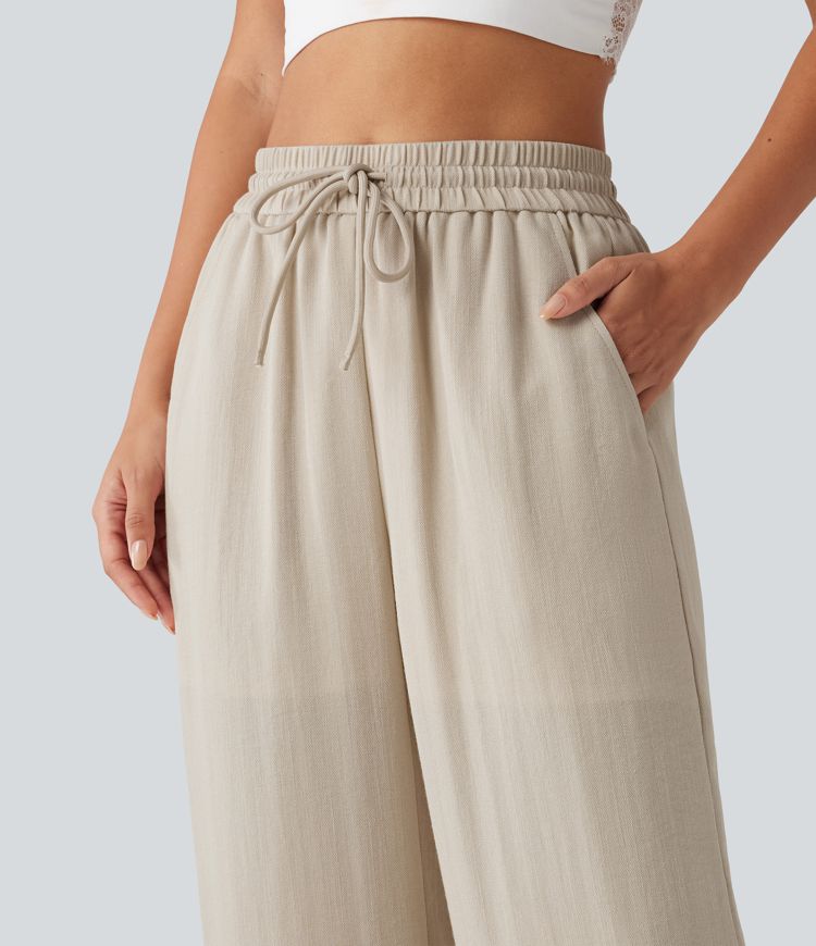 Lässige 2-in-1 Hose in Leinenoptik mit hohem Bund, Seitentaschen, Kordelzug und weitem Bein