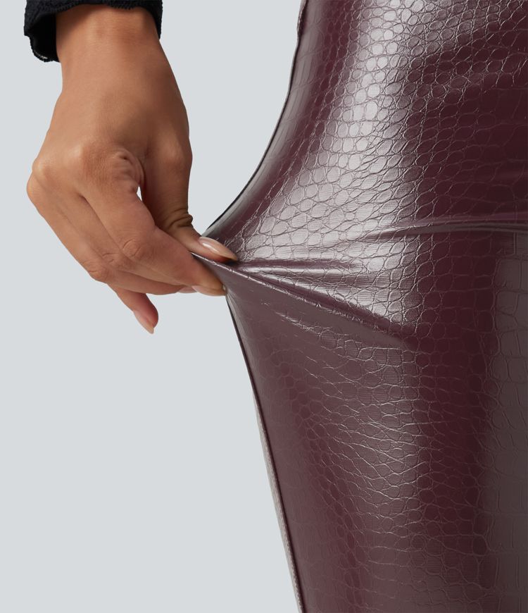 Lässige Fleece-Leggings aus elastischem Kunstleder mit hohem Bund, Gesäßtaschen und Schlangenmuster Lässige Fleece-Leggings aus elastischem Kunstleder mit hohem Bund, Gesäßtaschen und Schlangenmuster