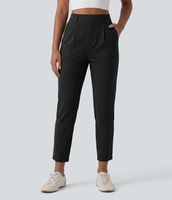 Schmal zulaufende Golfhose aus Krepp mit hohem Bund und Seitentaschen Schmal zulaufende Golfhose aus Krepp mit hohem Bund und Seitentaschen
