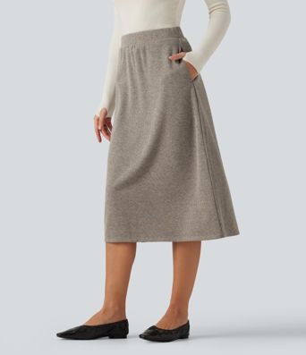 Lässiger, gerippter Midirock in A-Linie mit hohem Bund und Seitentaschen Lässiger, gerippter Midirock in A-Linie mit hohem Bund und Seitentaschen