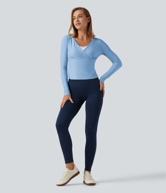 Top de yoga à encolure en V profonde, manches longues et coupe croisée