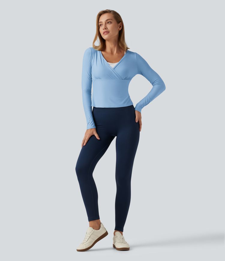 Top de yoga à encolure en V profonde, manches longues et coupe croisée