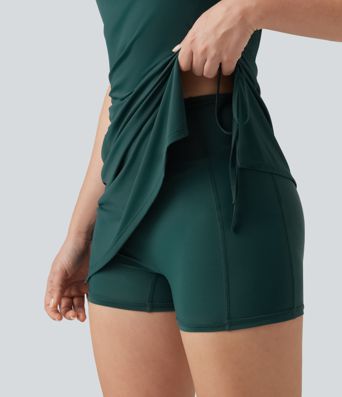 Robe mini moulante sans manches avec fronces, laçage, coussinets amovibles et poches, avec short séparé