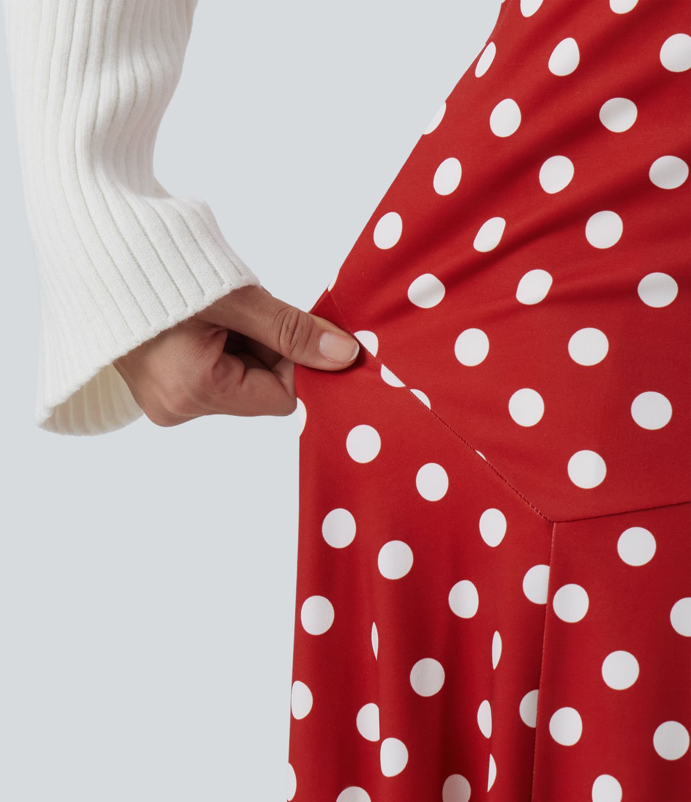 Jupe midi à pois taille haute avec ourlet asymétrique à volants et poches