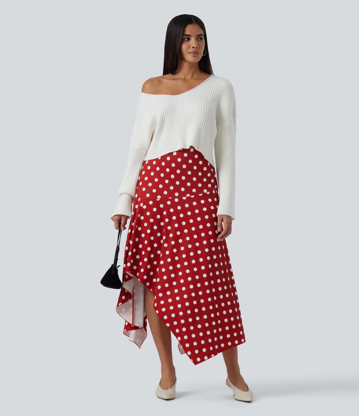 Jupe midi à pois taille haute avec ourlet asymétrique à volants et poches