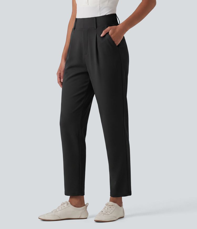 Schmal zulaufende Golfhose aus Krepp mit hohem Bund und Seitentaschen Schmal zulaufende Golfhose aus Krepp mit hohem Bund und Seitentaschen