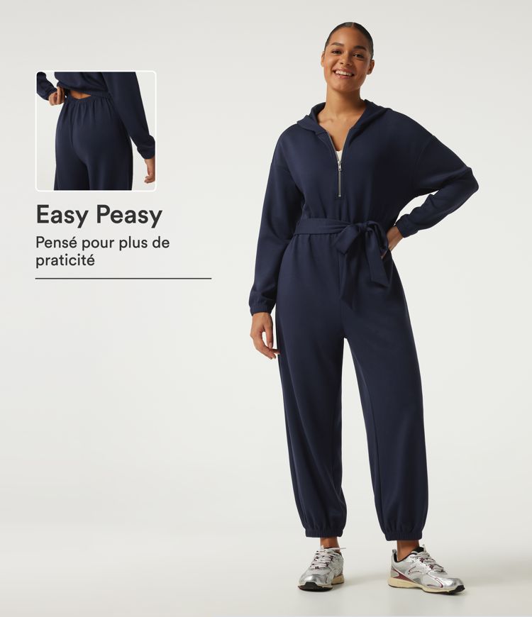Combinaison accès facile Easy Peasy à capuche, demi-zip et lien devant, coupe jogging 7/8 avec poches Combinaison accès facile Easy Peasy à capuche, demi-zip et lien devant, coupe jogging 7/8 avec poches