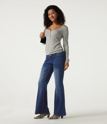 Jean flare Halara Flex™ à taille mi-haute avec poches Jean flare Halara Flex™ à taille mi-haute avec poches