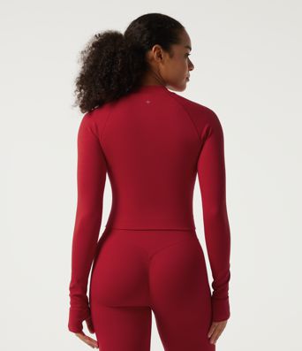 OneForm Seamless Flow — veste d'entraînement sans coutures à manches longues, avec ourlet incurvé et passe-pouces OneForm Seamless Flow — veste d'entraînement sans coutures à manches longues, avec ourlet incurvé et passe-pouces
