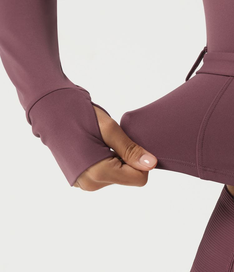 Halara UltraSculpt™ veste de yoga pour silhouettes courbes, col montant, manches longues et ceinture à boucle