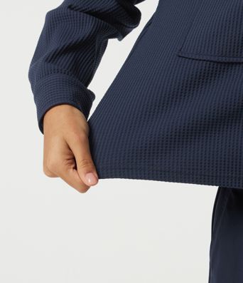 Veste décontractée gaufrée à col à revers, épaules tombantes, manches longues, avec poches