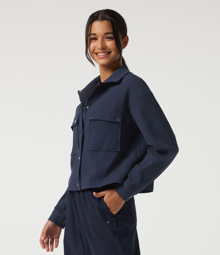 Veste décontractée gaufrée à col à revers, épaules tombantes, manches longues, avec poches