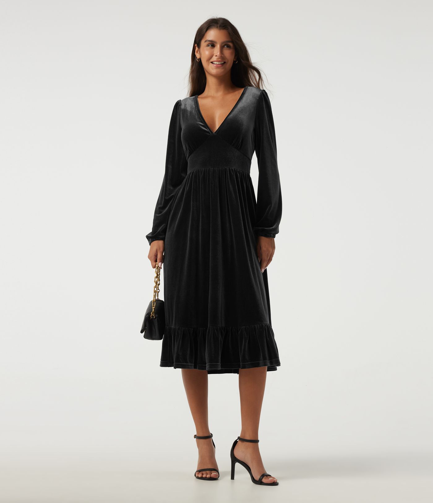 Robe midi en velours à col V profond, manches longues et ourlet à volants