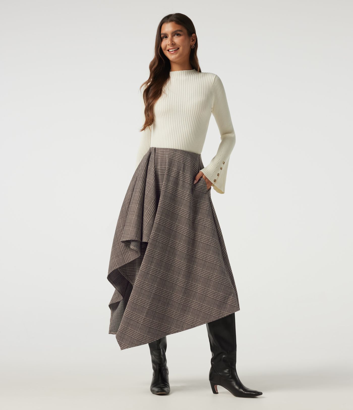 Lässiger Midirock in A-Linie mit hohem Bund, Seitentaschen, Karomuster und asymmetrischem Design Lässiger Midirock in A-Linie mit hohem Bund, Seitentaschen, Karomuster und asymmetrischem Design
