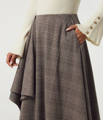 Lässiger Midirock in A-Linie mit hohem Bund, Seitentaschen, Karomuster und asymmetrischem Design Lässiger Midirock in A-Linie mit hohem Bund, Seitentaschen, Karomuster und asymmetrischem Design