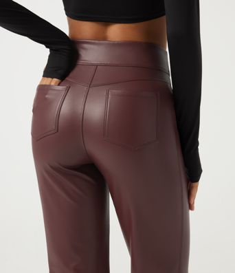 Hoch geschnittene, ausgestellte Freizeithose mit Kontrastnetz, dehnbarem PU-Fleece und Taschen