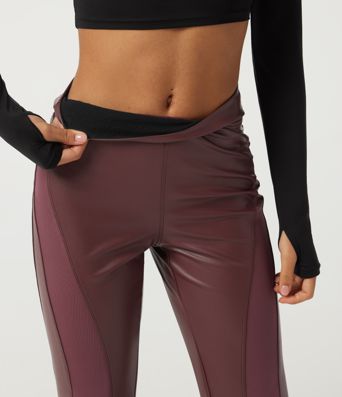 Hoch geschnittene, ausgestellte Freizeithose mit Kontrastnetz, dehnbarem PU-Fleece und Taschen