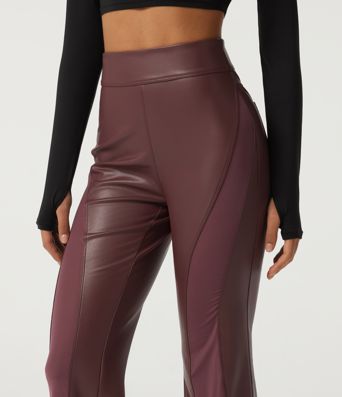 Hoch geschnittene, ausgestellte Freizeithose mit Kontrastnetz, dehnbarem PU-Fleece und Taschen