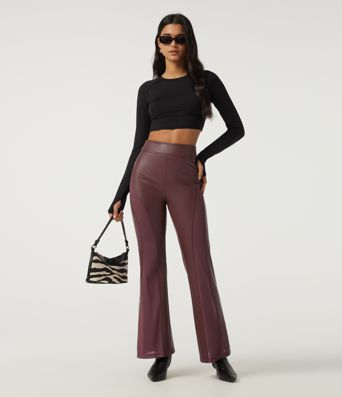 Hoch geschnittene, ausgestellte Freizeithose mit Kontrastnetz, dehnbarem PU-Fleece und Taschen