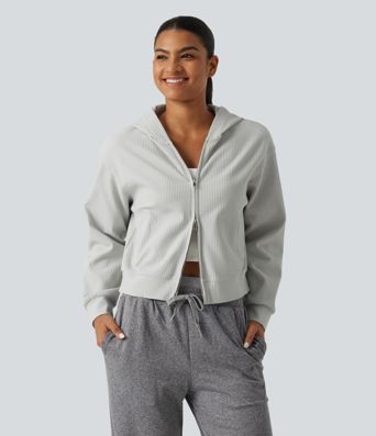 Langeärmelige, lässige Kapuzenjacke aus Waffelstrick mit Taschen Langeärmelige, lässige Kapuzenjacke aus Waffelstrick mit Taschen