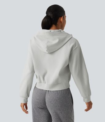 Langeärmelige, lässige Kapuzenjacke aus Waffelstrick mit Taschen Langeärmelige, lässige Kapuzenjacke aus Waffelstrick mit Taschen