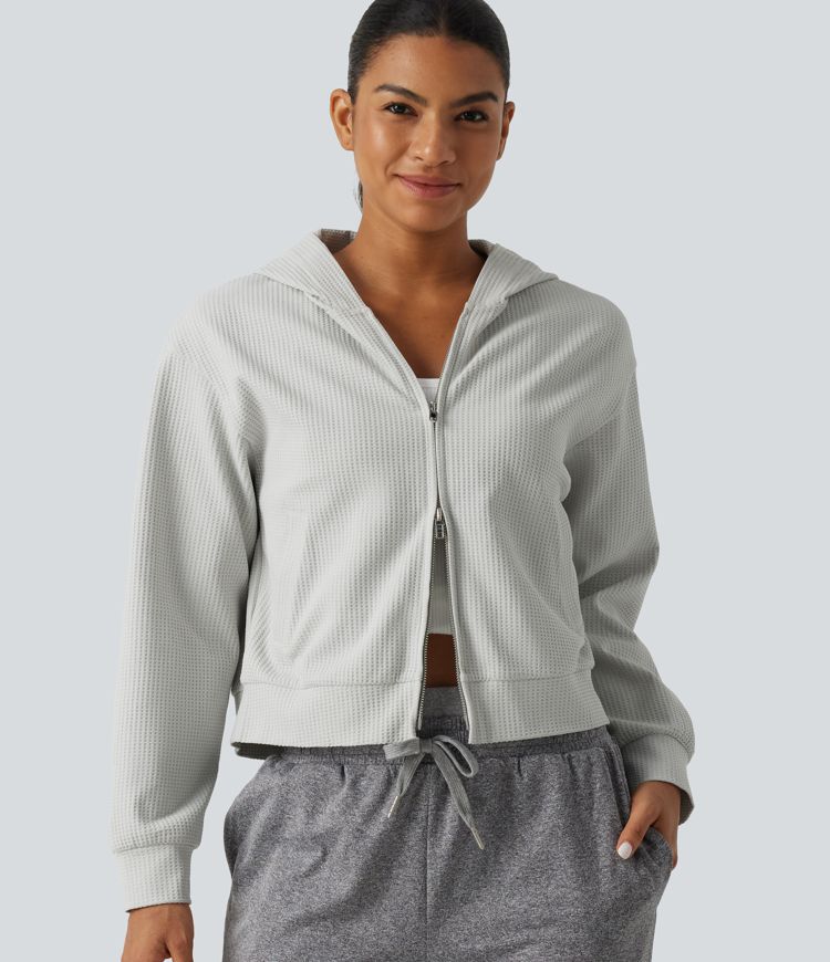 Langeärmelige, lässige Kapuzenjacke aus Waffelstrick mit Taschen Langeärmelige, lässige Kapuzenjacke aus Waffelstrick mit Taschen
