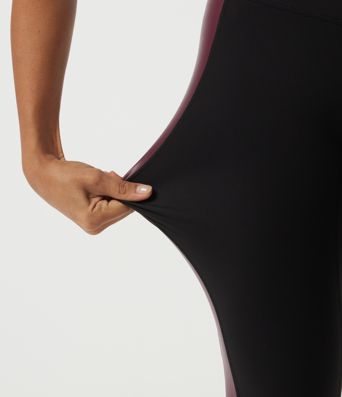 High-Waist Yoga-Leggings aus dehnbarem PU mit bauchformendem Effekt, Color-Block-Design und Tasche