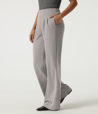 Pantalones casual acampanados de cintura alta en tejido waffle con bolsillos