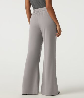 Pantalones casual acampanados de cintura alta en tejido waffle con bolsillos