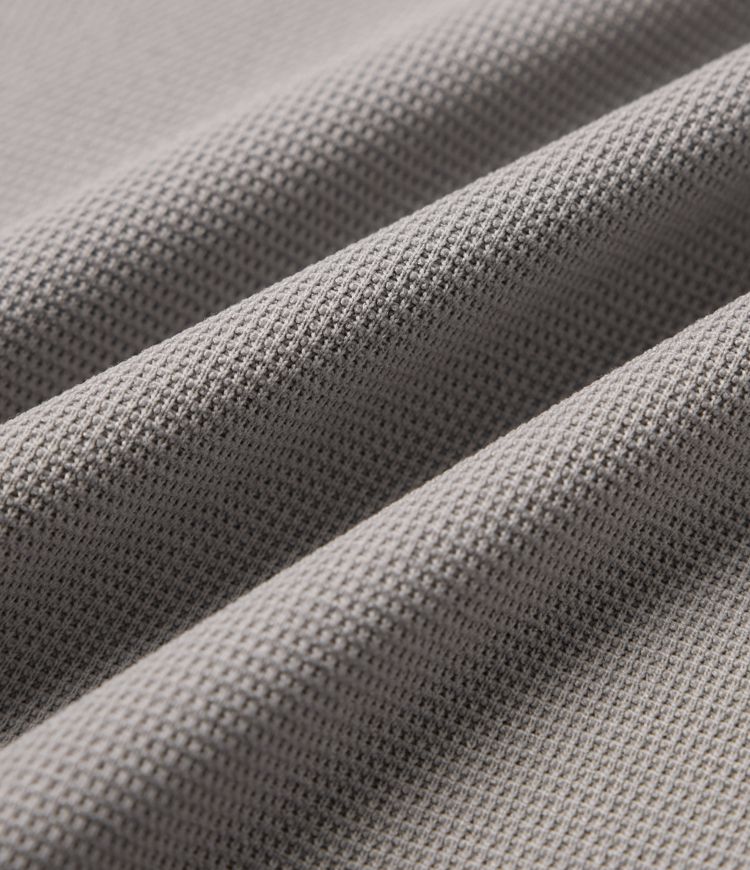 Pantalones casual acampanados de cintura alta en tejido waffle con bolsillos