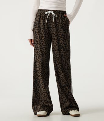 Pantalon léopard taille haute coupe large à cordon de serrage avec bandes latérales Pantalon léopard taille haute coupe large à cordon de serrage avec bandes latérales