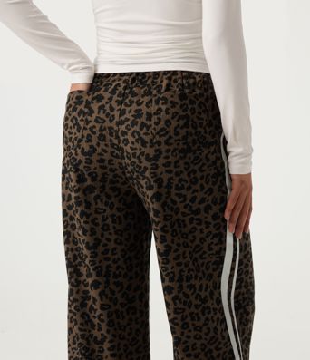 Pantalon léopard taille haute coupe large à cordon de serrage avec bandes latérales Pantalon léopard taille haute coupe large à cordon de serrage avec bandes latérales