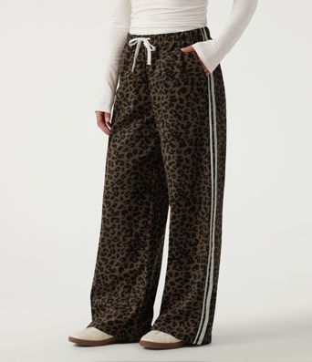 Pantalon léopard taille haute coupe large à cordon de serrage avec bandes latérales Pantalon léopard taille haute coupe large à cordon de serrage avec bandes latérales