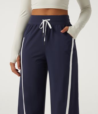 Pantalon de tennis taille haute à cordon, jambe large, ourlet incurvé, à blocs de couleur, séchage rapide InstantCool, avec poches — UPF40+