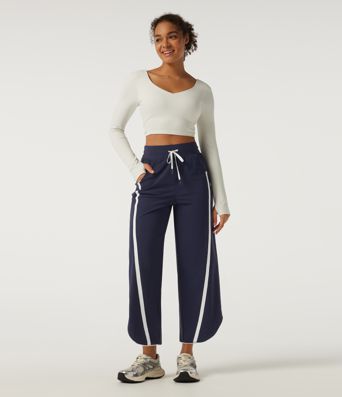 Pantalon de tennis taille haute à cordon, jambe large, ourlet incurvé, à blocs de couleur, séchage rapide InstantCool, avec poches — UPF40+