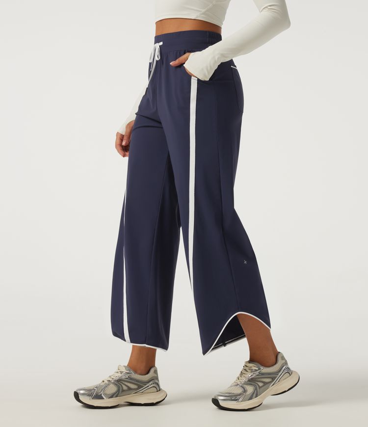 Pantalon de tennis taille haute à cordon, jambe large, ourlet incurvé, à blocs de couleur, séchage rapide InstantCool, avec poches — UPF40+
