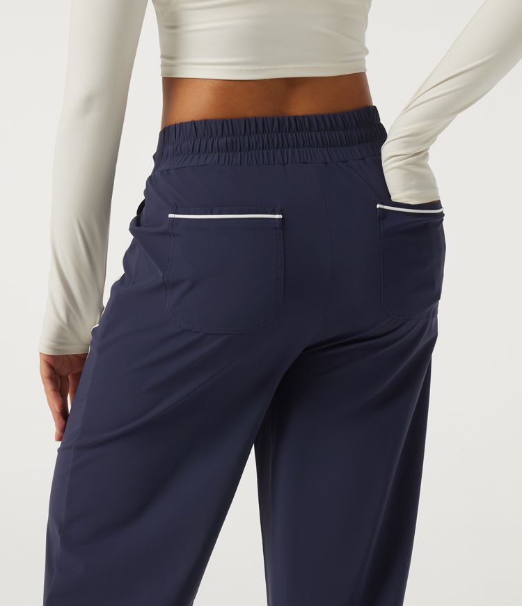 Pantalon de tennis taille haute à cordon, jambe large, ourlet incurvé, à blocs de couleur, séchage rapide InstantCool, avec poches — UPF40+
