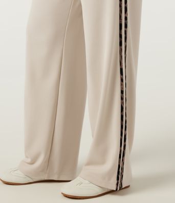 Pantalon décontracté en tissu gaufré, taille haute, à cordon, coupe droite, bande latérale, imprimé léopard, avec poches.