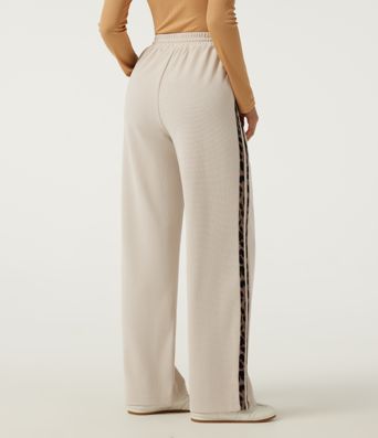 Pantalon décontracté en tissu gaufré, taille haute, à cordon, coupe droite, bande latérale, imprimé léopard, avec poches.