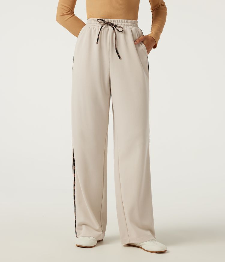 Pantalon décontracté en tissu gaufré, taille haute, à cordon, coupe droite, bande latérale, imprimé léopard, avec poches.