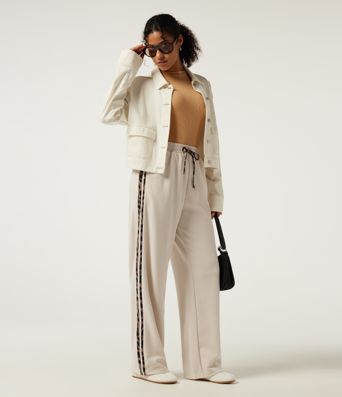 Pantalon décontracté en tissu gaufré, taille haute, à cordon, coupe droite, bande latérale, imprimé léopard, avec poches.