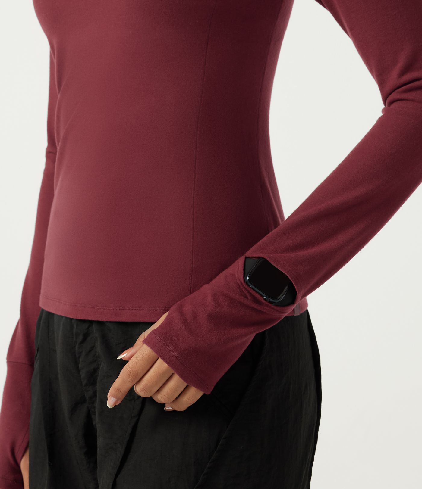 Halara HeatCore top casual térmico de cuello alto, manga larga raglán, con aberturas para los pulgares.