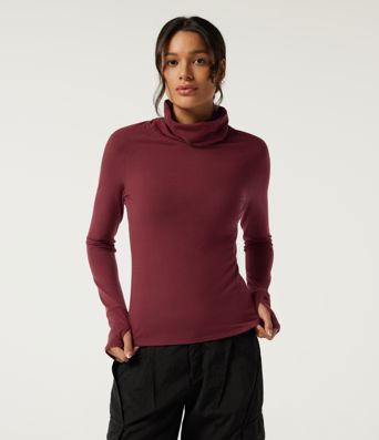 Halara HeatCore top casual térmico de cuello alto, manga larga raglán, con aberturas para los pulgares.